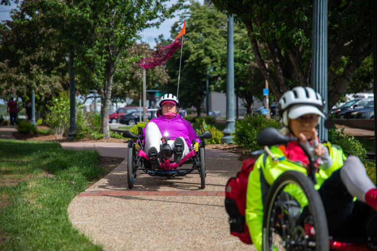 recumbent bicyclers on a Downtown Cedar Rapids recreation trail